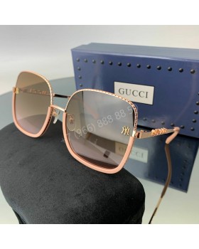 Солнцезащитные очки Gucci