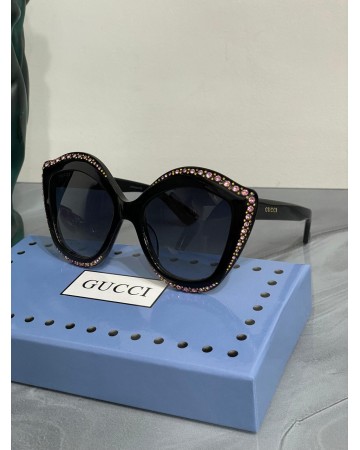 Солнцезащитные очки Gucci