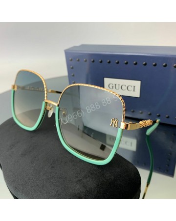 Солнцезащитные очки Gucci