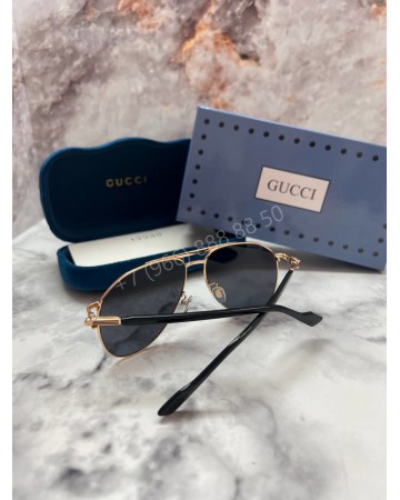 Солнцезащитные очки Gucci