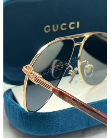 Солнцезащитные очки Gucci