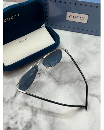 Солнцезащитные очки Gucci